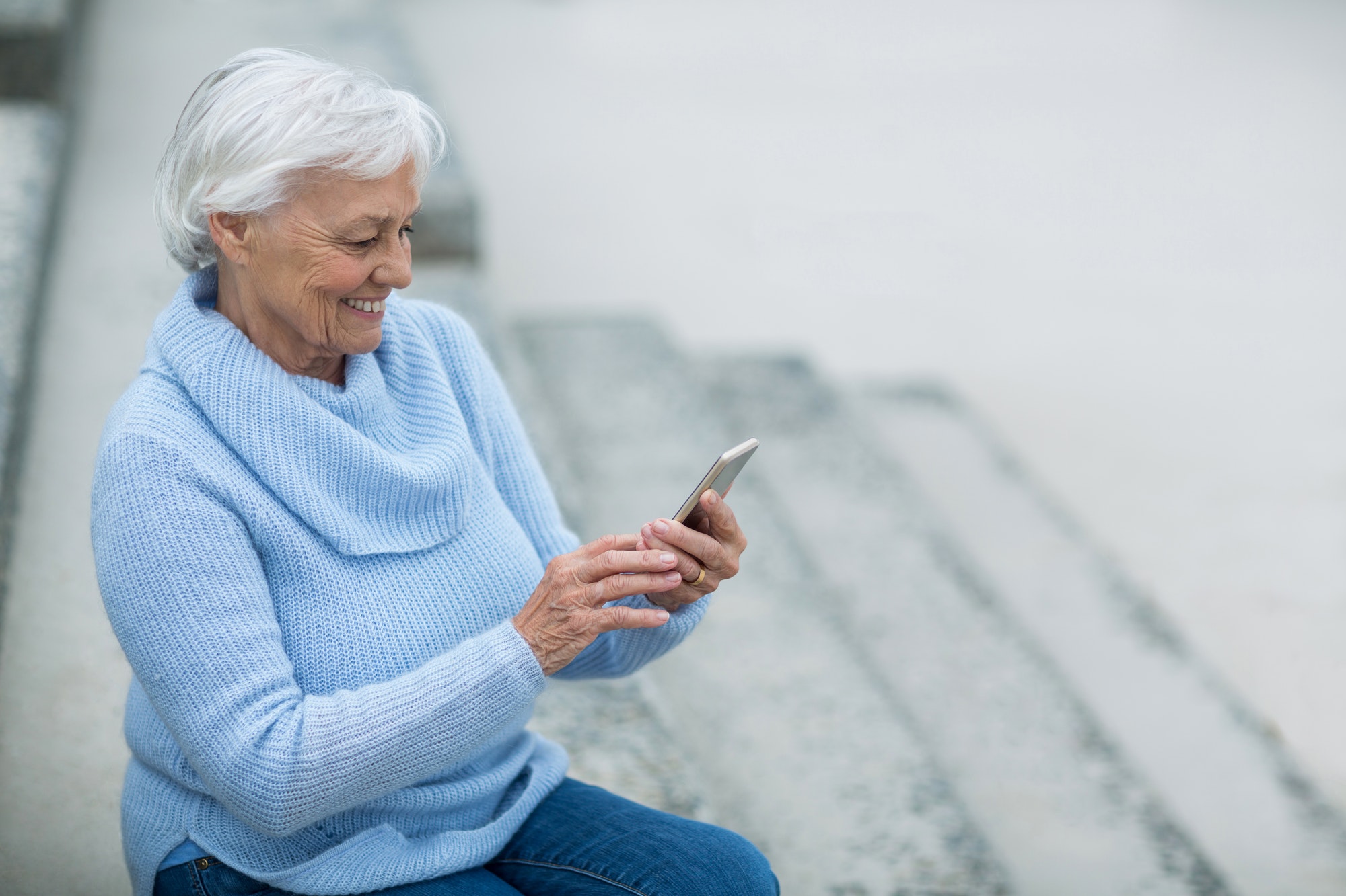 Senior woman using mobile phone